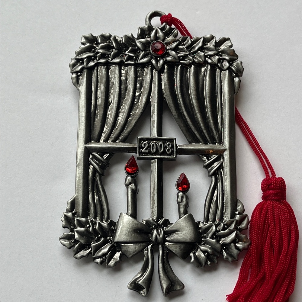 Avon 2008 Pewter Ornament with Red Tassel